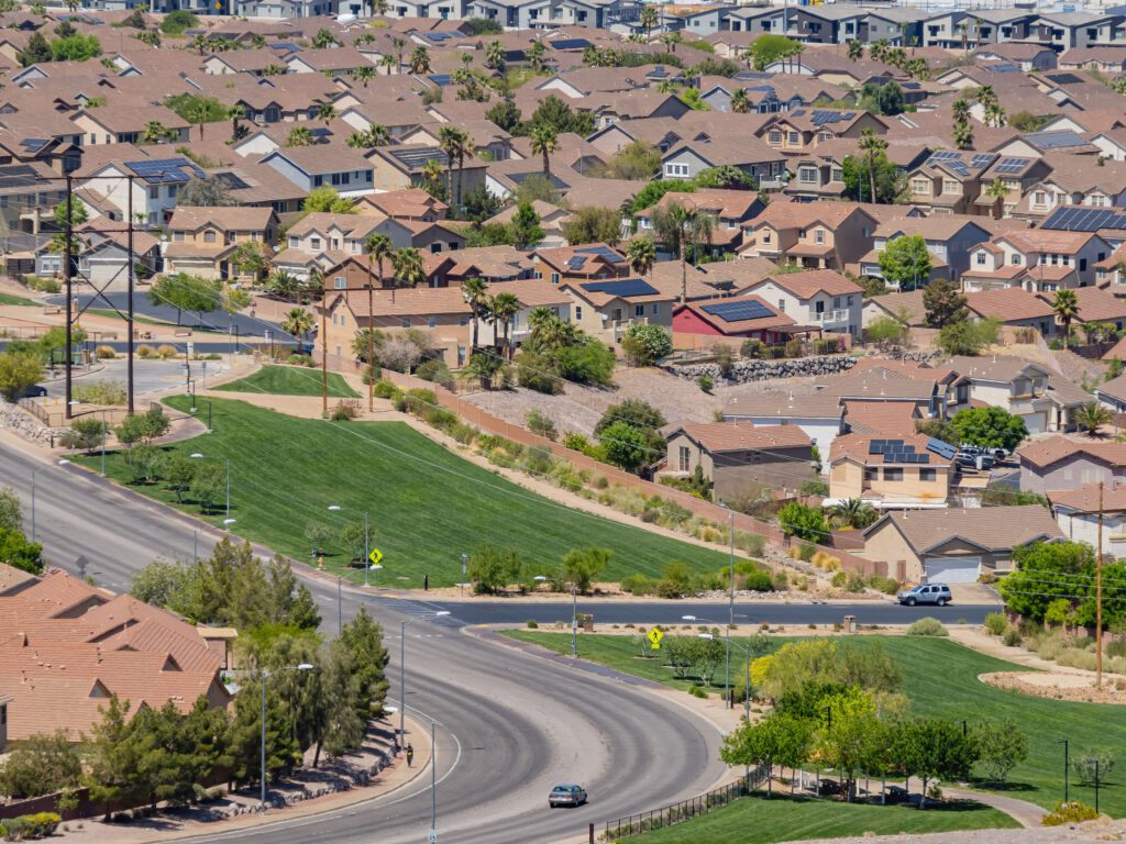 High angle view of Henderson cityscape showcasing urban development and scenic desert surroundings in Clark County, Nevada.