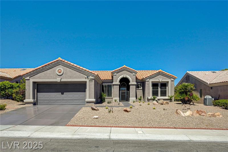 Exterior view of a home on Highland Falls Golf Course in Sun City Summerlin