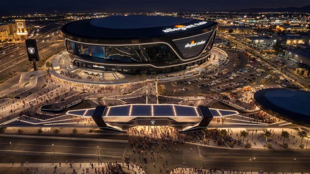 Architectural rendering of the proposed $158 million North Entry Plaza upgrade at Allegiant Stadium, featuring an elevated pedestrian deck, illuminated entry canopy, and integrated walkways.