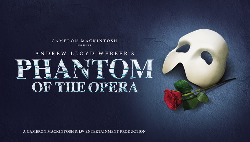 A promotional image for Andrew Lloyd Webber's "The Phantom of the Opera" feature on a Las Vegas event blog. Set against a distressed gothic deep blue background, it features the iconic white half-face mask and single red rose. The large, ice-blue title text "PHANTOM OF THE OPERA" has a crackled effect, and production credits for Cameron Mackintosh and Andrew Lloyd Webber are visible. The top-left features text identifying it as the "Spotlight Event of the Week" for the Smith Center run.